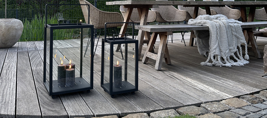 Black modern outdoor lanterns with grey candle lights 