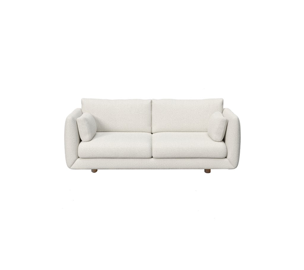 Moderne witte bank met twee kussens.