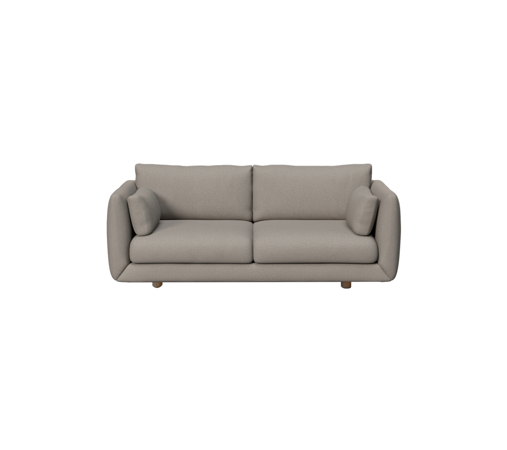 Lichtbruine moderne sofa met ronde kussens in een lounge-setting.