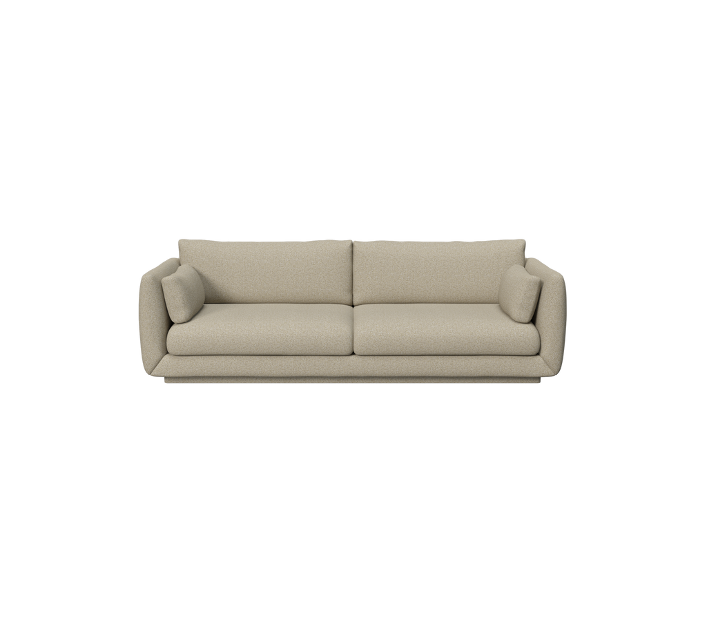 Bruine moderne bank met pluche kussens in een lounge-setting.