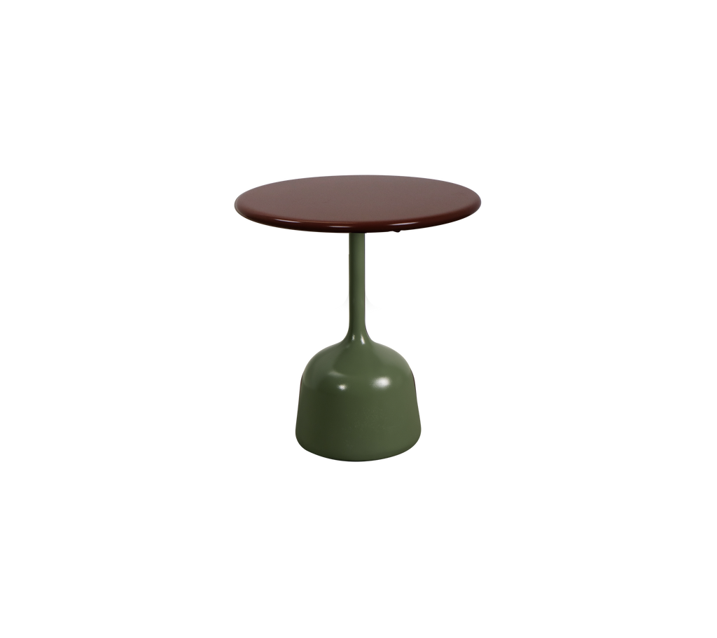 Olijfgroene tafel met een bordeauxkleurig blad.