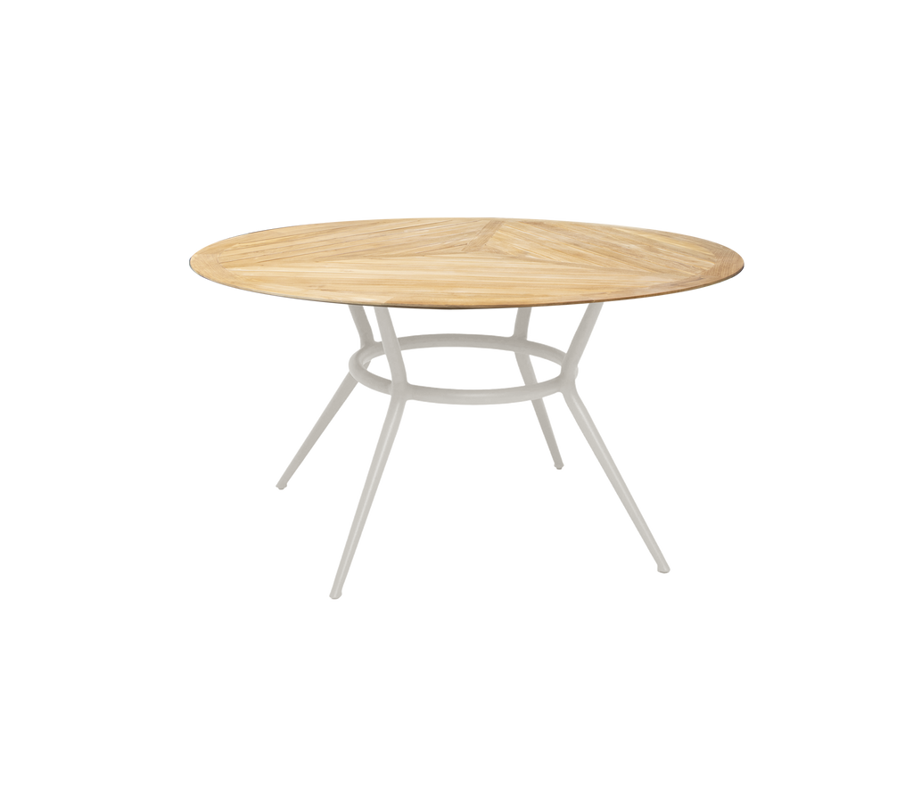 Modern rond tafel met een lichte houten blad en witte poten.
