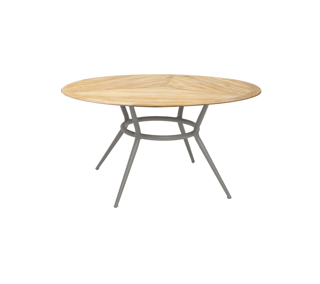 Taupe ronde tafel met een eenvoudig ontwerp en slanke poten.