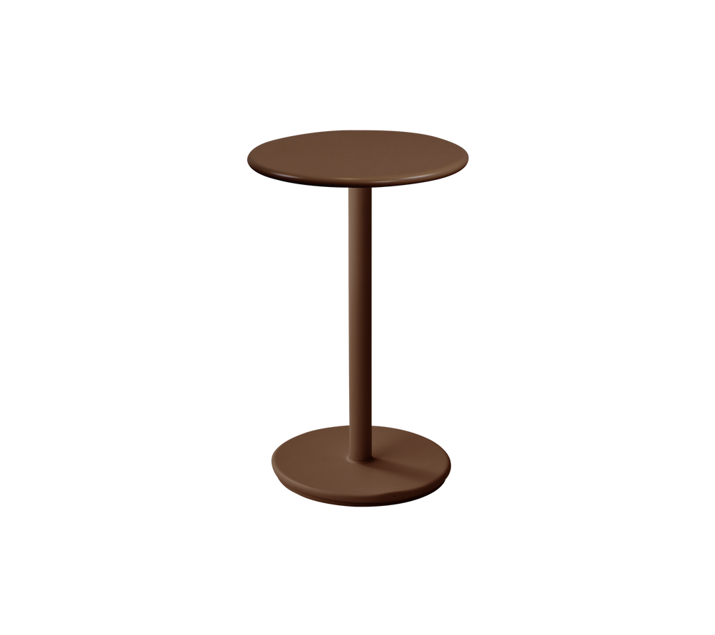 Modern ronde tafel in woestijnrode kleur.