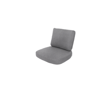 Grijze gestoffeerde stoel met een eenvoudig ontwerp, met een comfortabele rugleuning en zitting voor ontspanning.